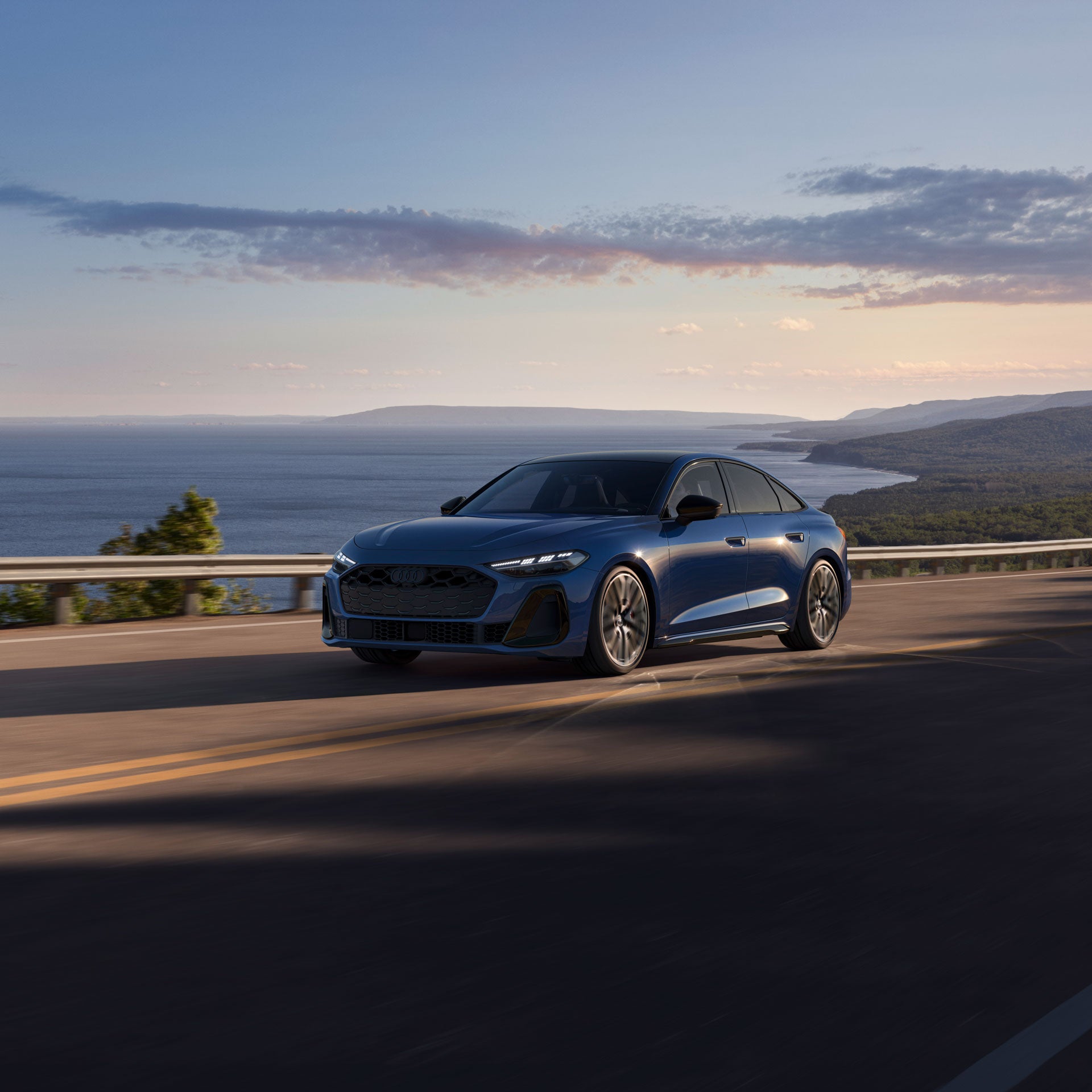 Three-quarter front view of the all-new Audi S5 in motion.