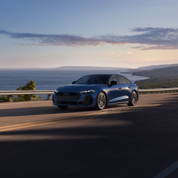 Front view of the Audi S5 in motion.