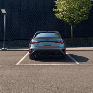 Rear view of an Audi S3 parked outside.