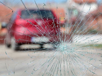 View of broken windshield. 