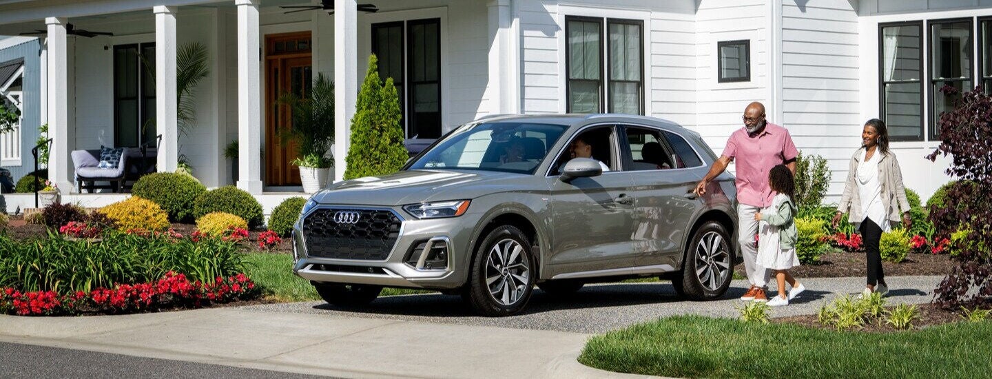 Family getting ready to drive an Audi