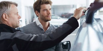 Service technician checking the car