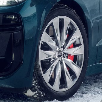 Service technician serving vehicle.