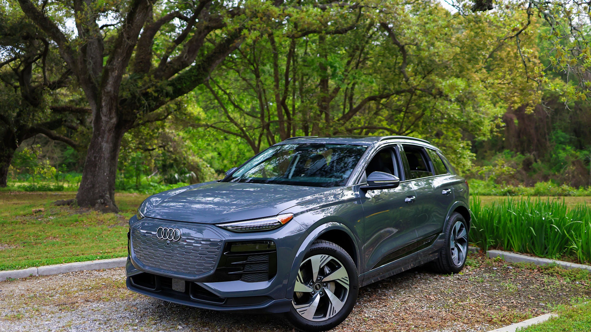 Left profile view of an Audi q8 vehicle parked.