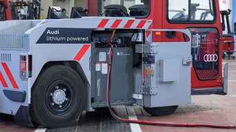 Image of an electric powered Audi service vehicle. 