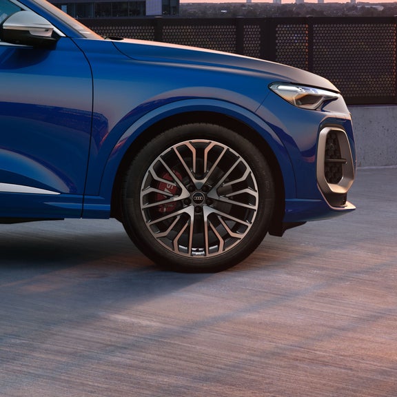 View of the interior cabin, showing the front seats, of the Audi Q5 Sportback.