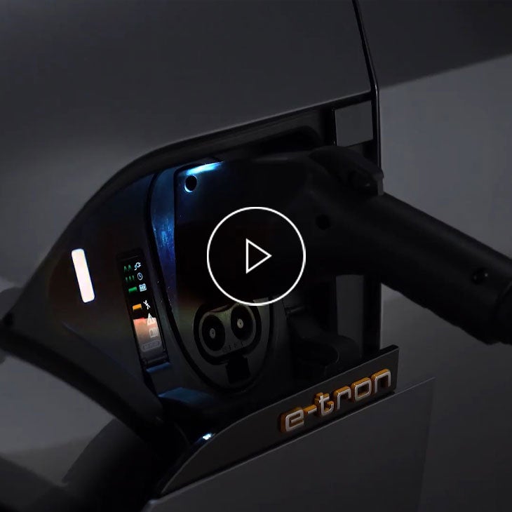 Close up on the charging port of an Audi e-tron. 