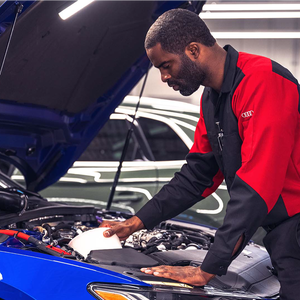 Technician adding air filter