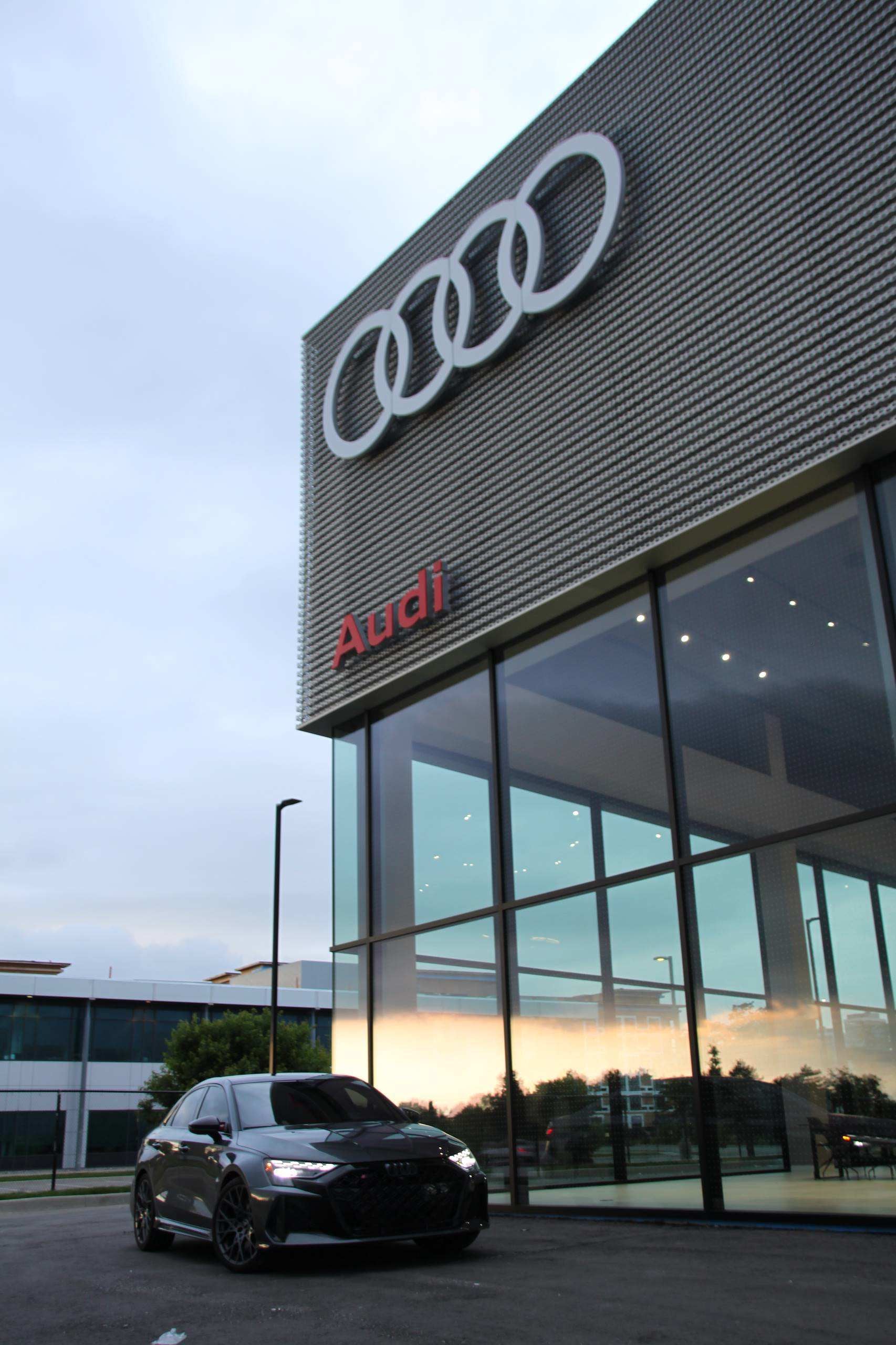 Left profile view of an Audi q8 vehicle parked.