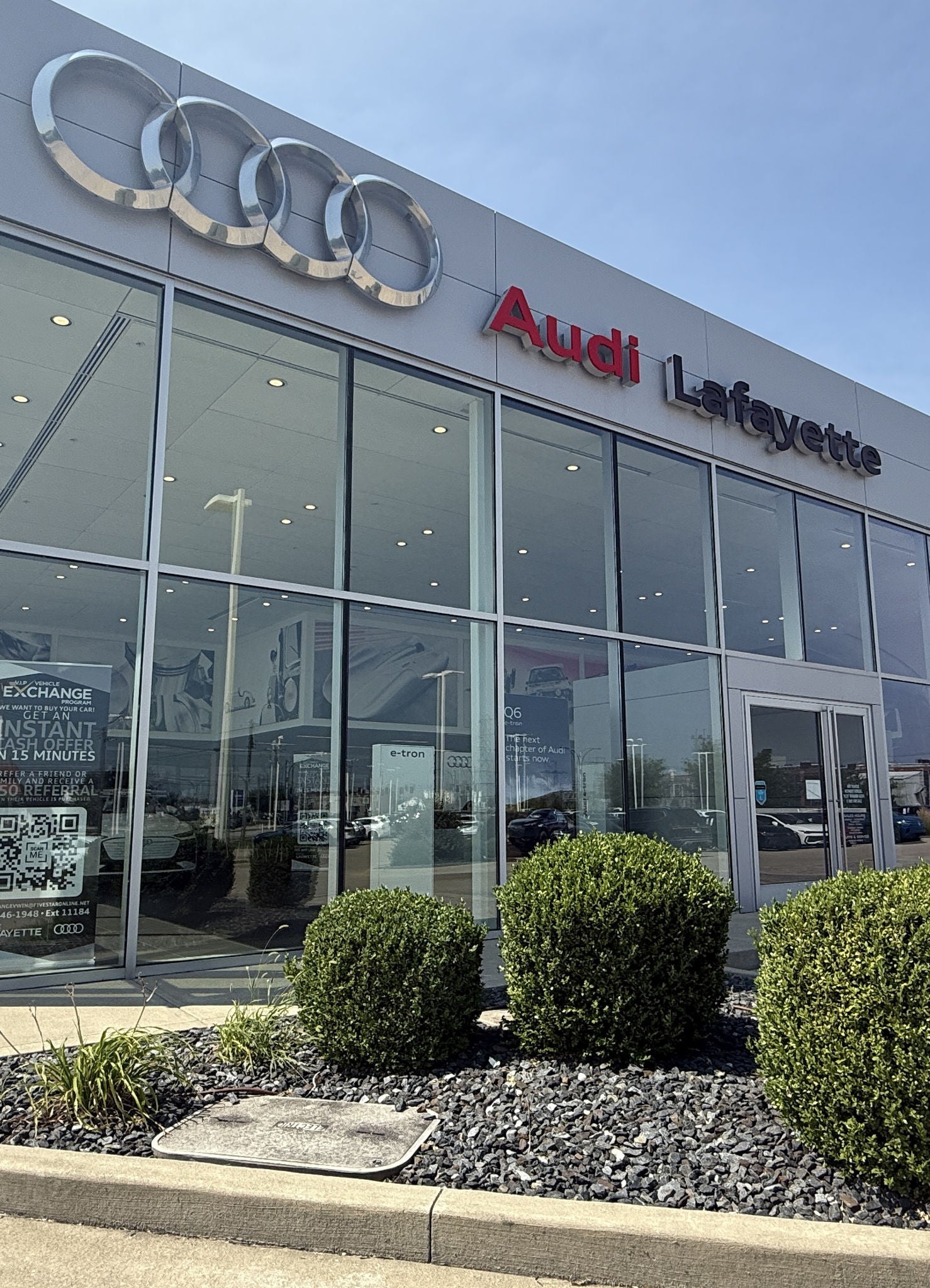 Audi 2025 Audi Q6 e-tron left profile driving.