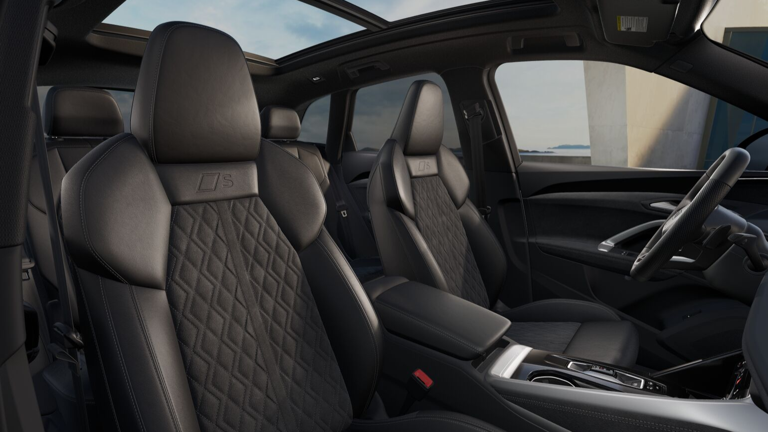 Front-row black seats inside of a 2026 SQ5. 