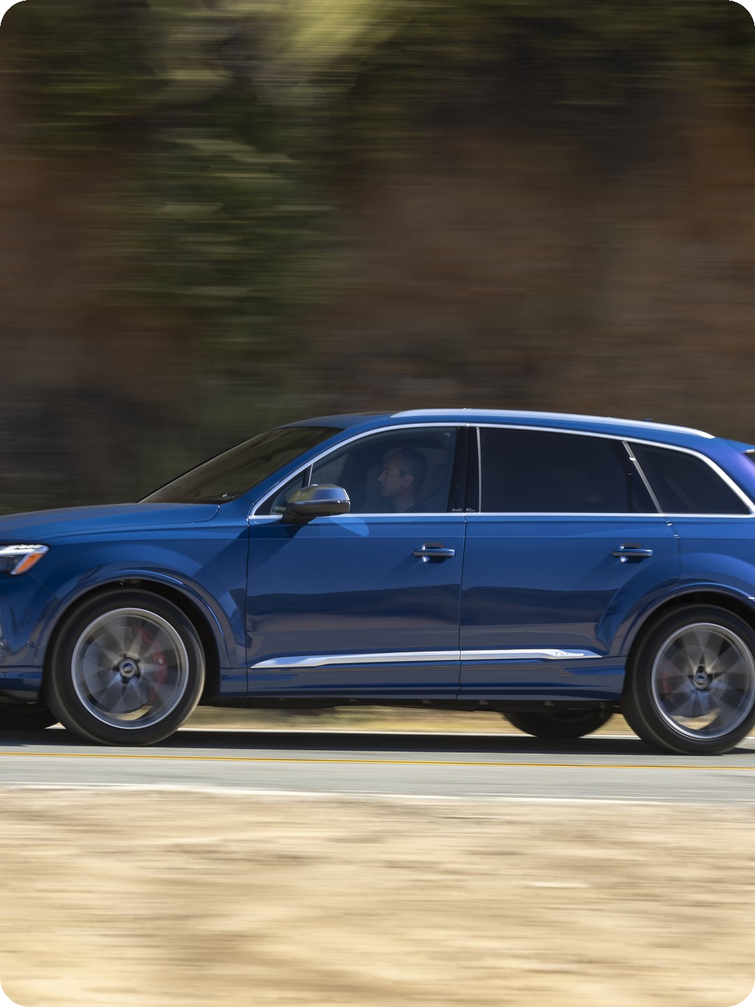 Audi SQ7 — 500 HP performance three-row SUV.