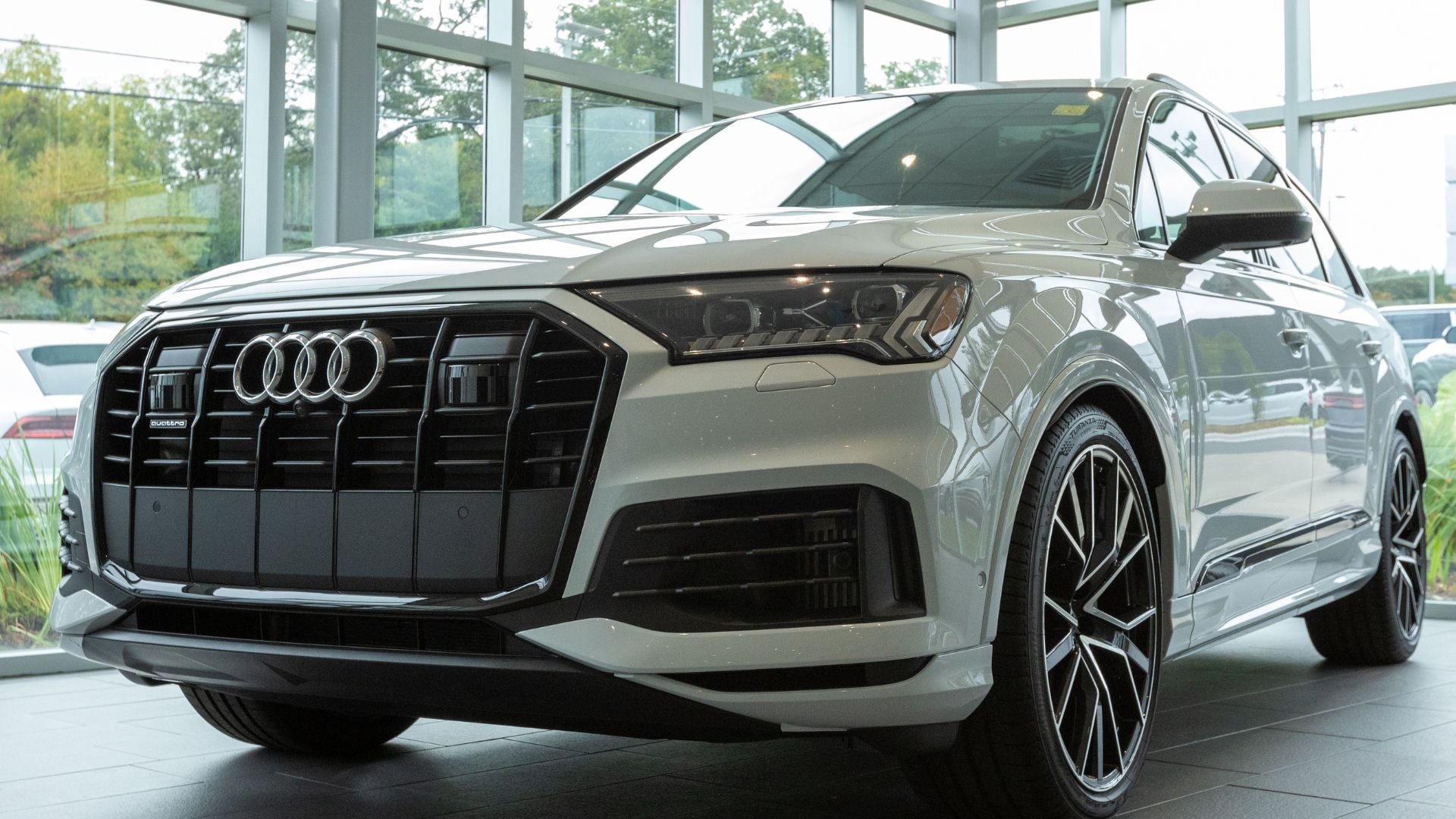 Front view of Audi model parked.