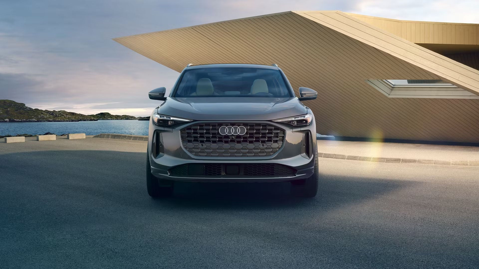 Right profile view of an Audi Q8 e-tron parked.