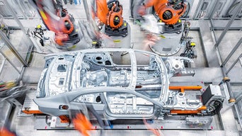 Frame of an Audi vehicle on an assembly line.