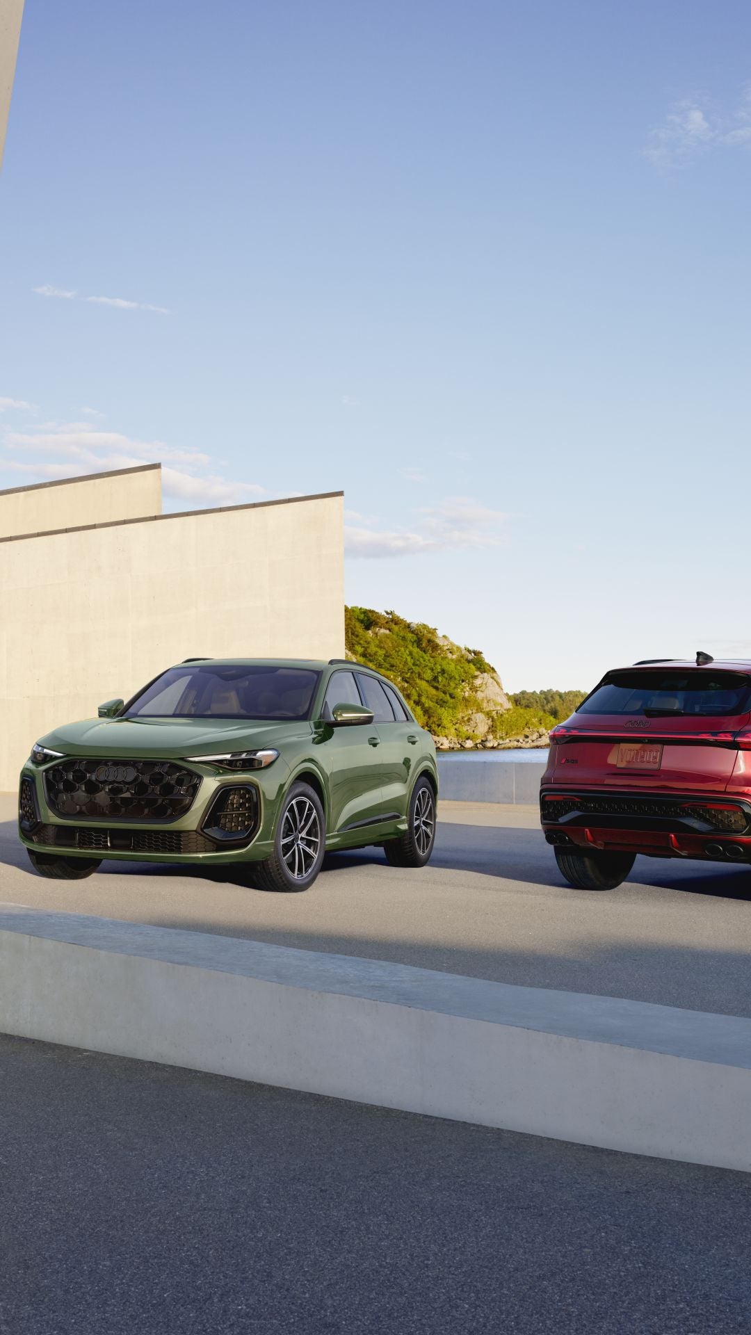 Front and rear profile view of Audi Q5's parked side by side.
