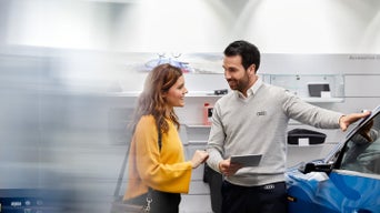 Salesperson speaking with a customer