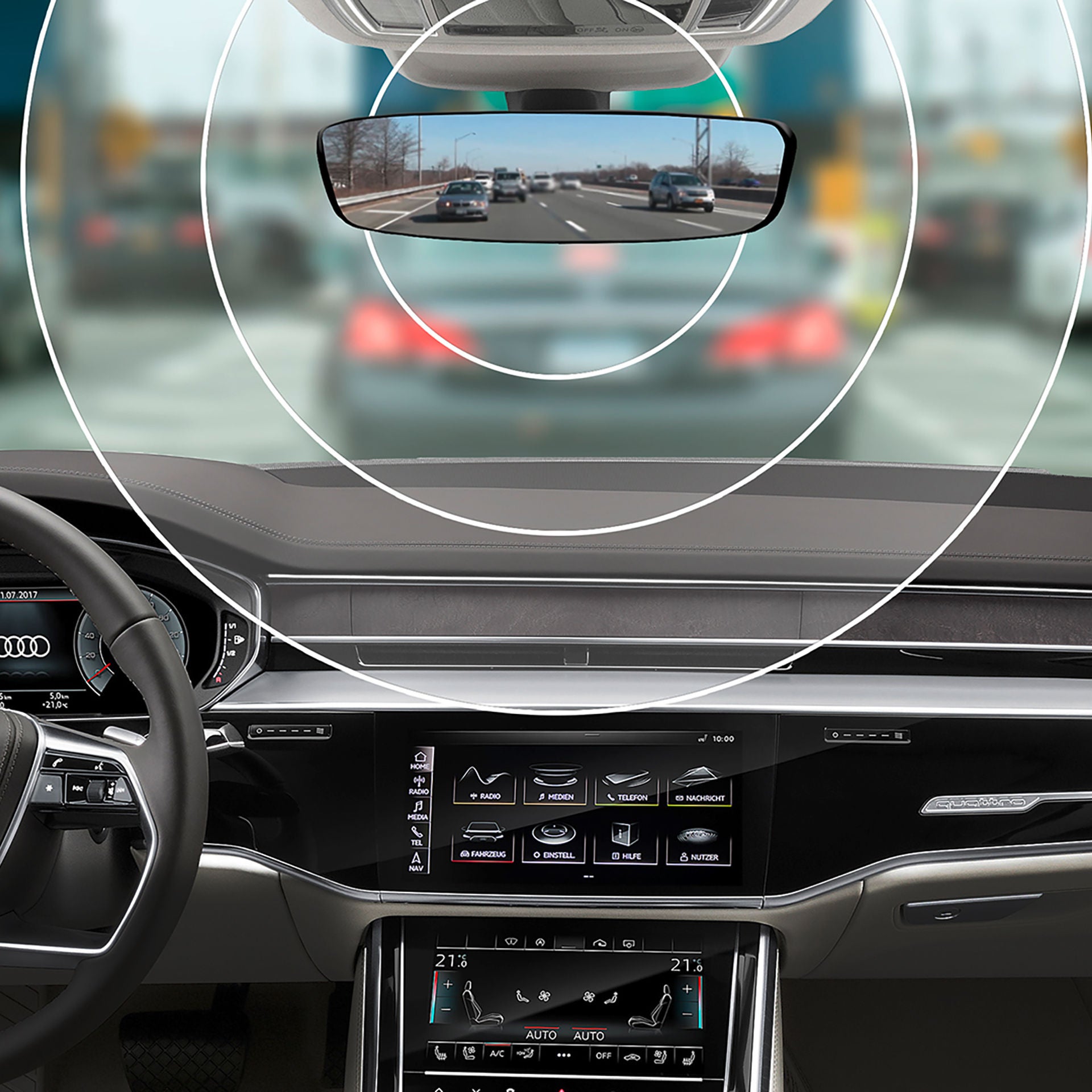 Interior view of Audi vehicle showing the wheel, MMI, virtual cockpit and Integrated Toll Module.