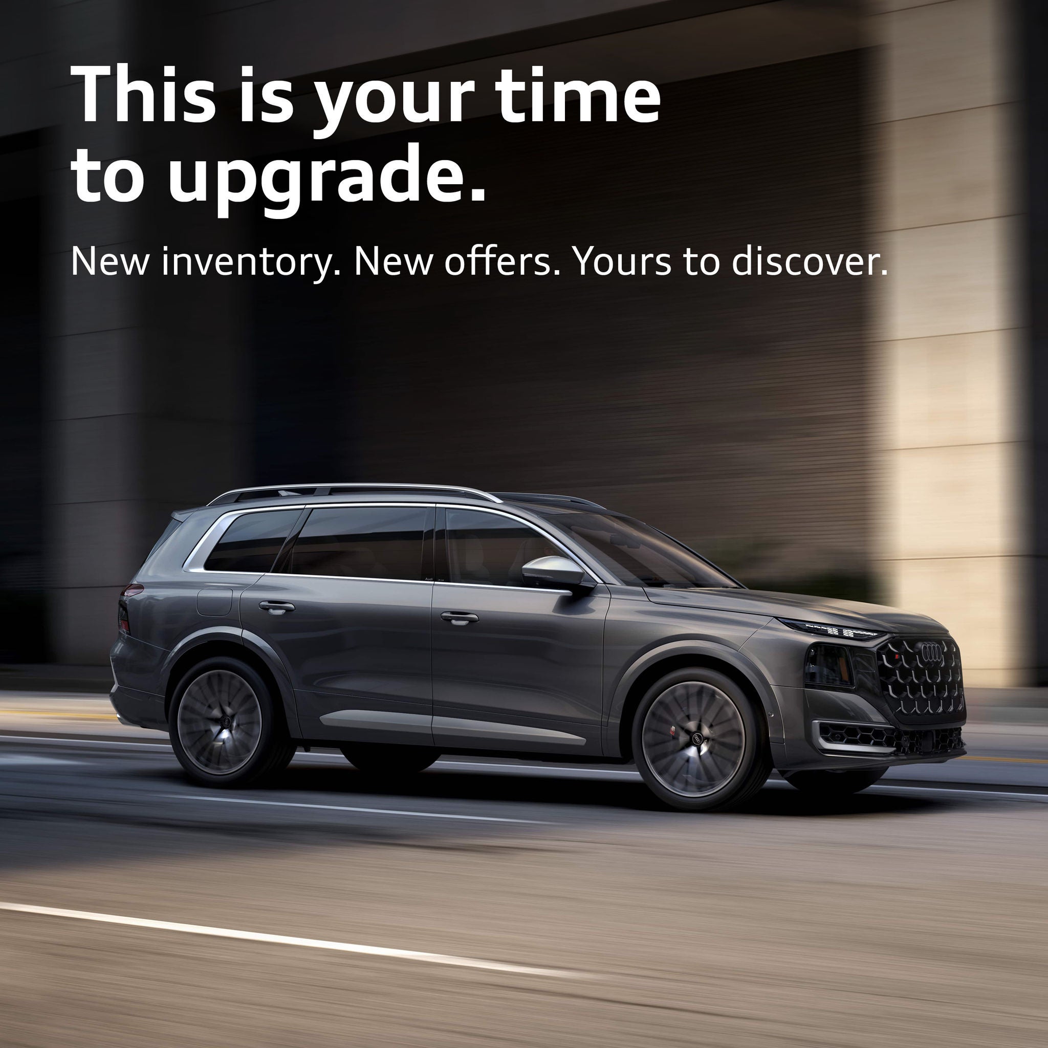Rear profile view of an Audi Q5 parked.