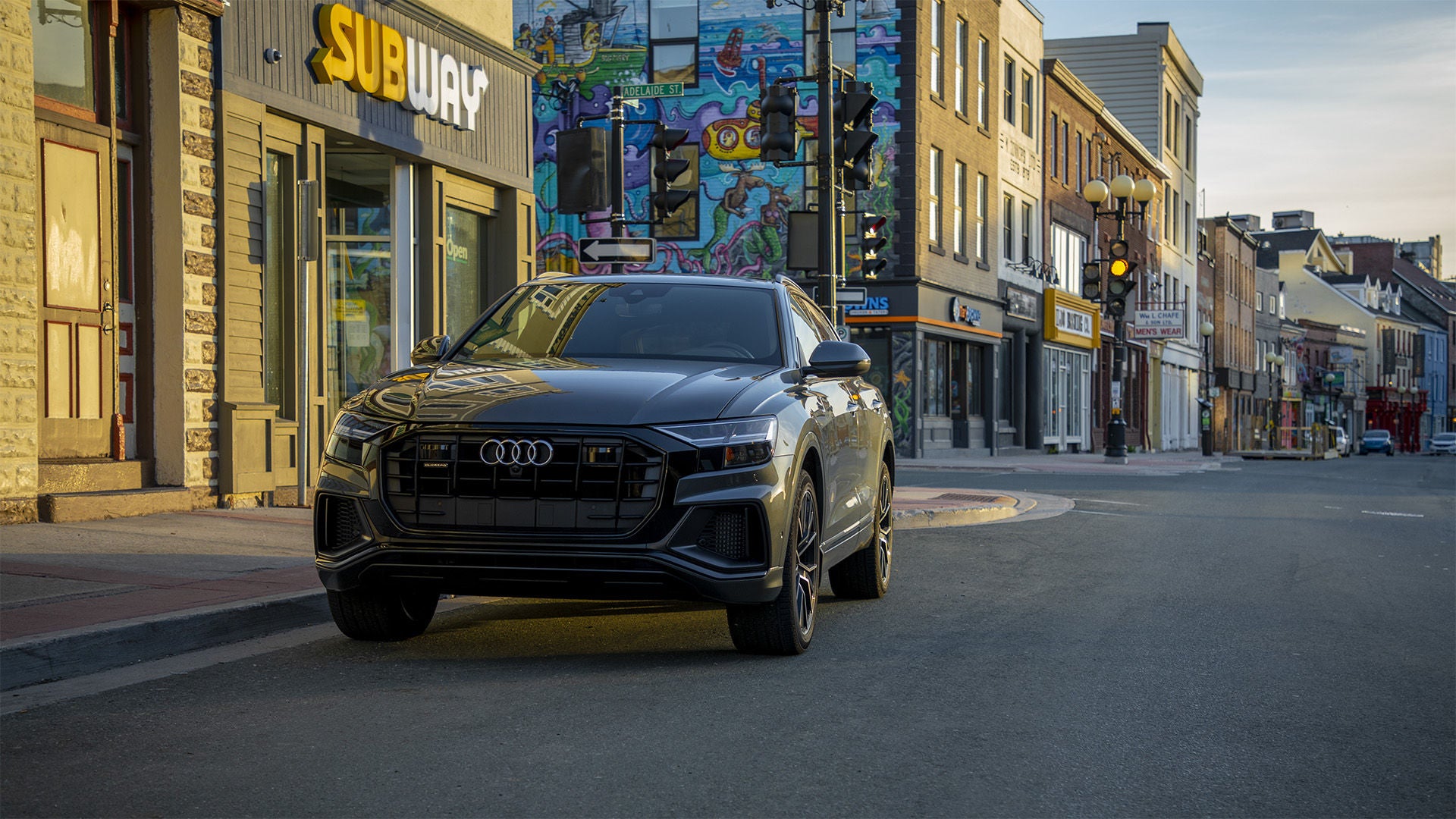 Left profile view of an Audi q8 vehicle parked.