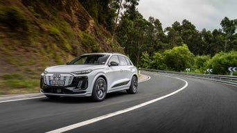 Q6 etron driving on the road