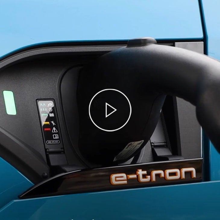  Close-up of an Audi vehicle charging. 