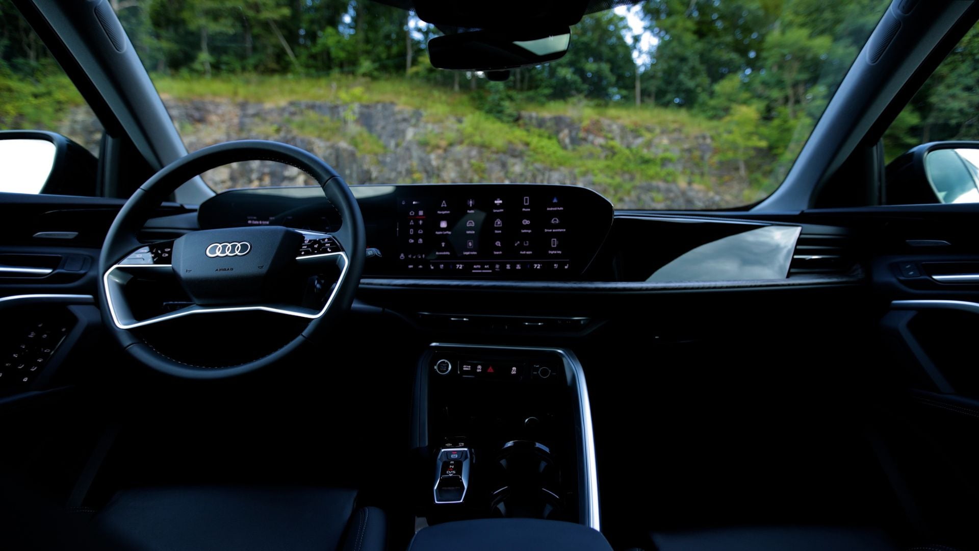 Interior of the Audi Q5 showcasing the front dash and infotainment system