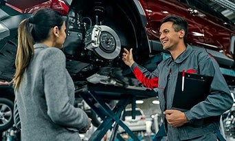 Technician assisting employee. 