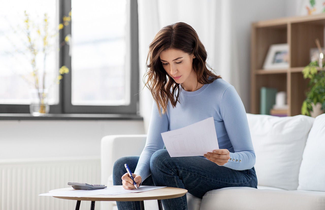 Woman calculating Audi finance