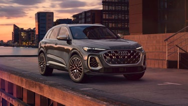 Three quarter profile of the Audi Q5 parked by the pier.