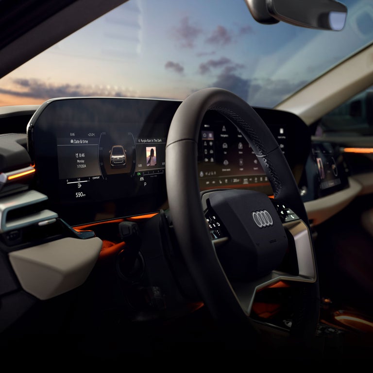 Gros plan sur la roue et le cockpit virtuel de l’Audi A5.