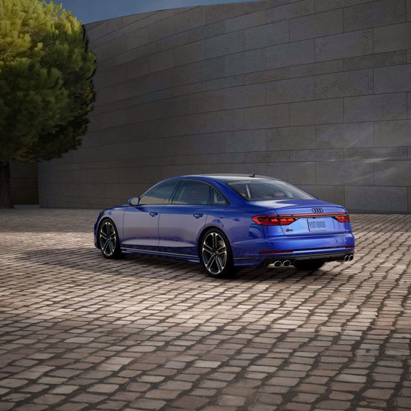 Three-quarter side view of the Audi S8 parked.
