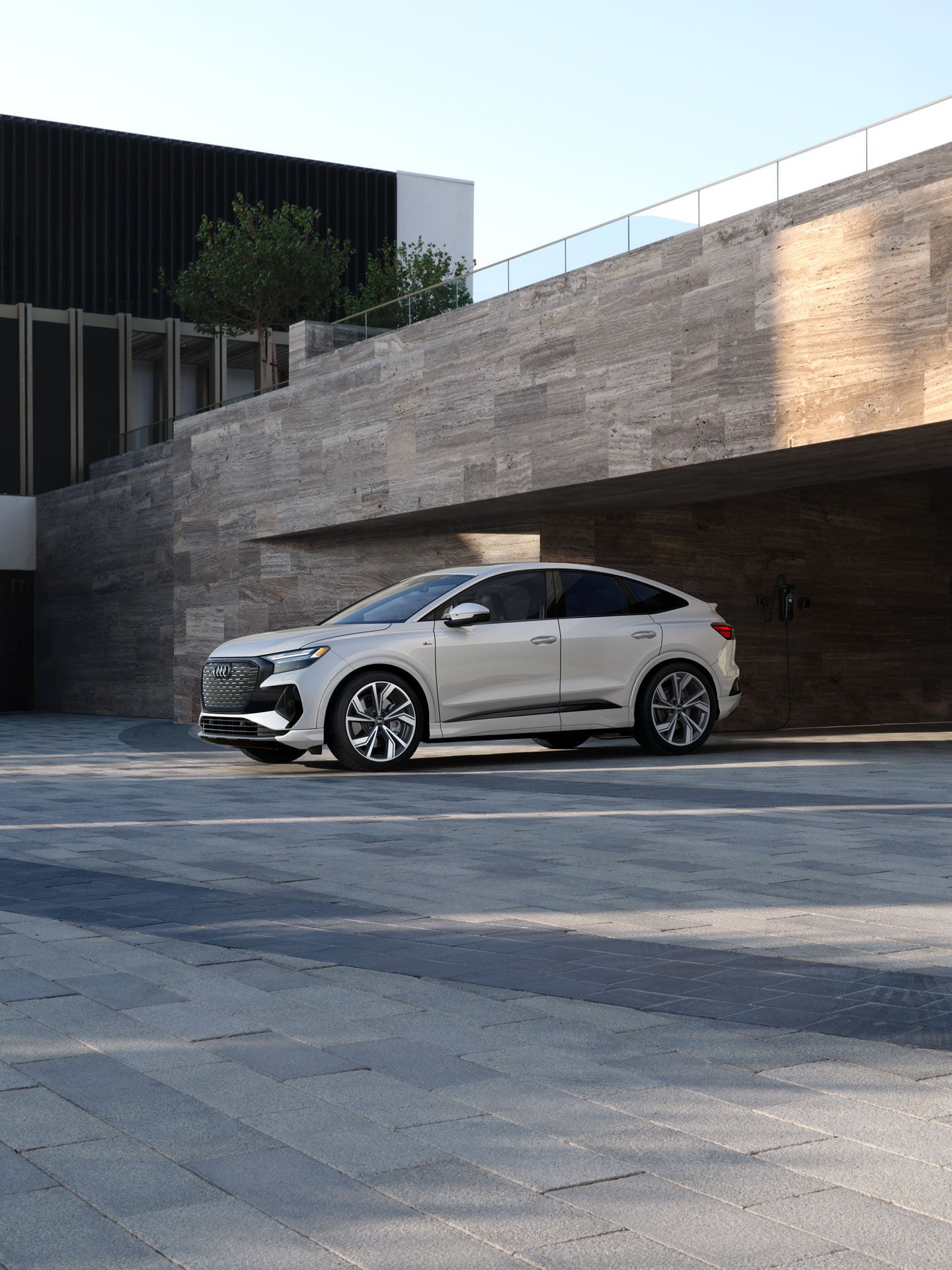 Side profile of the Audi Q4 Sportback e-tron®.