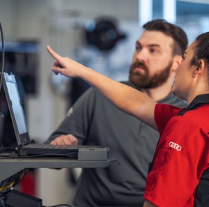Technician and client discussing repair
