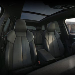 Interior view of the Audi Q6 e-tron, showing the ventilated front seats.