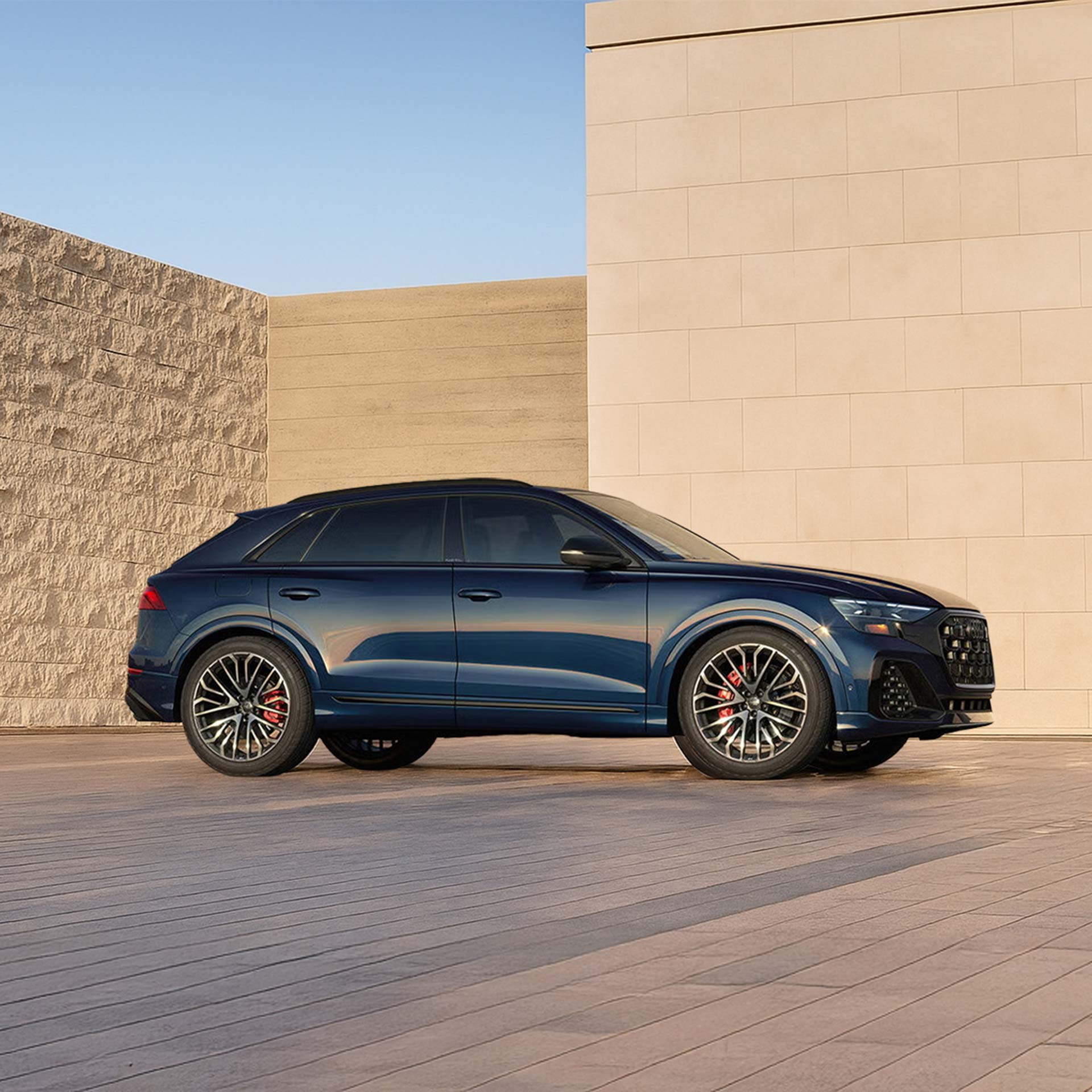 Front profile of the Audi Q4 e-tron accelerating.