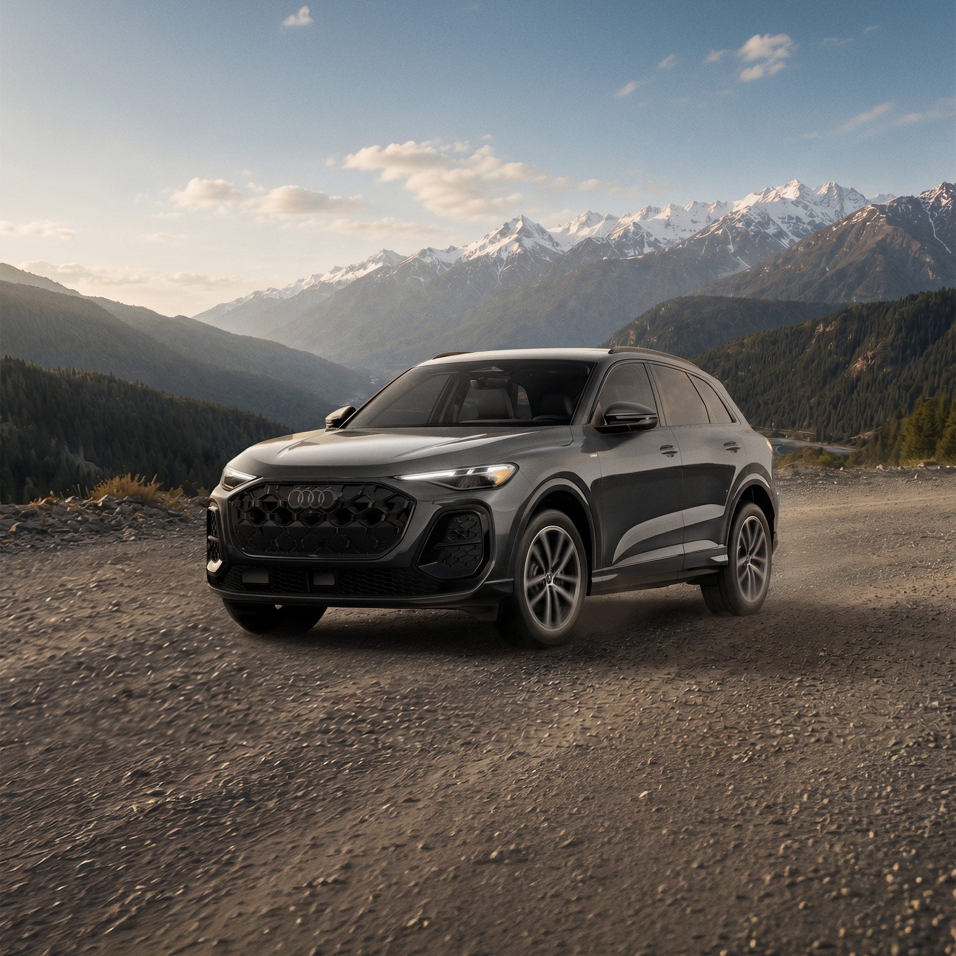 Three-quarter front profile of an Audi SQ5 accelerating. 