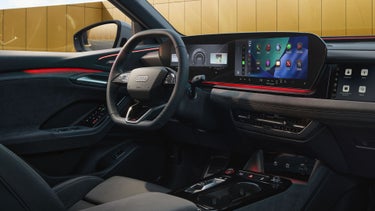 Interior view of the driver's cockpit of the Audi SQ6 Sportback e-tron, showing the interior lighting technology.