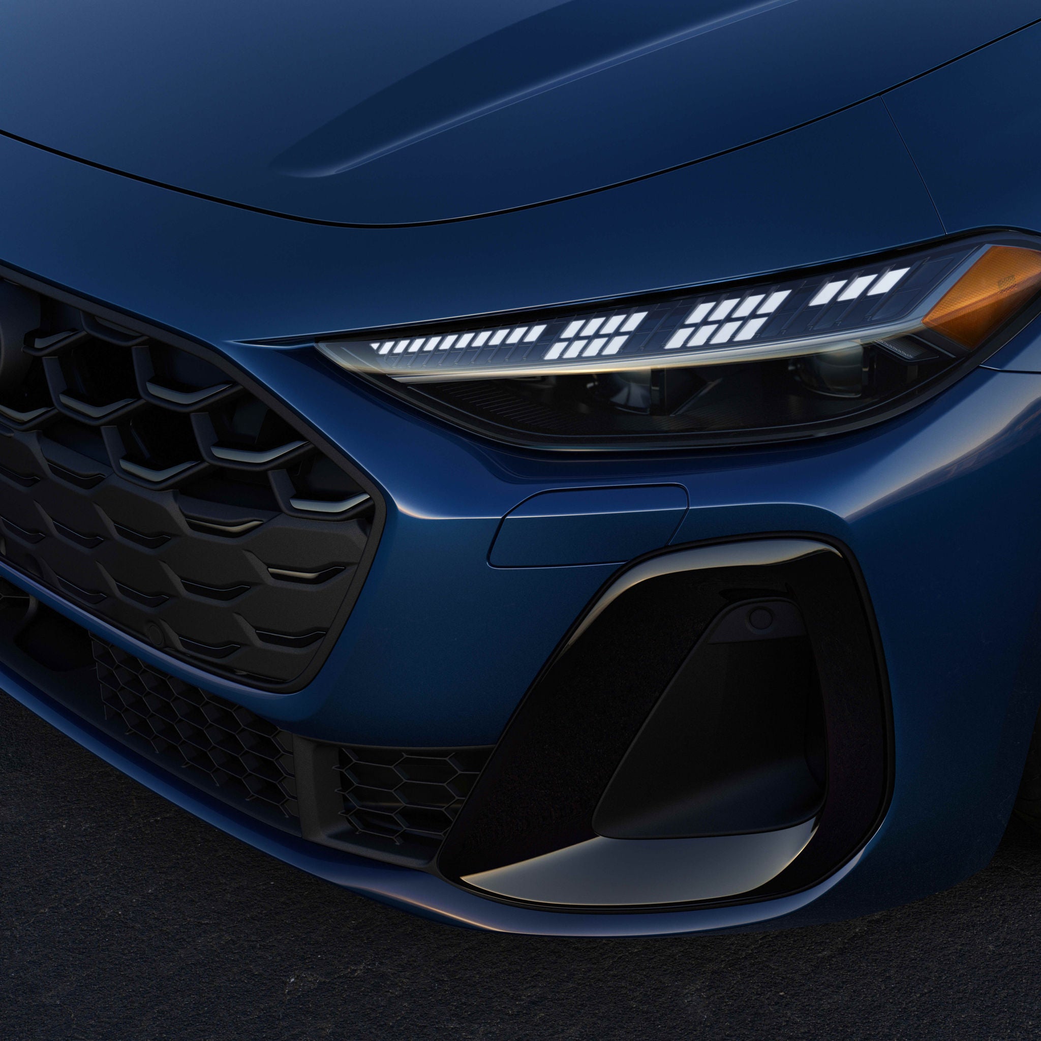 Three quarter view of an Audi S5 parked.