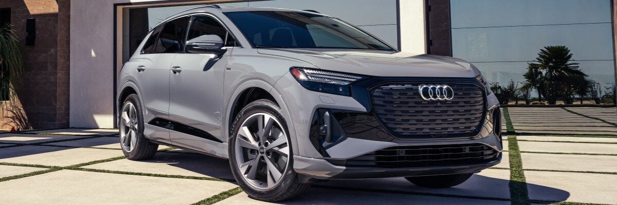 Audi Electric car park in front of the house