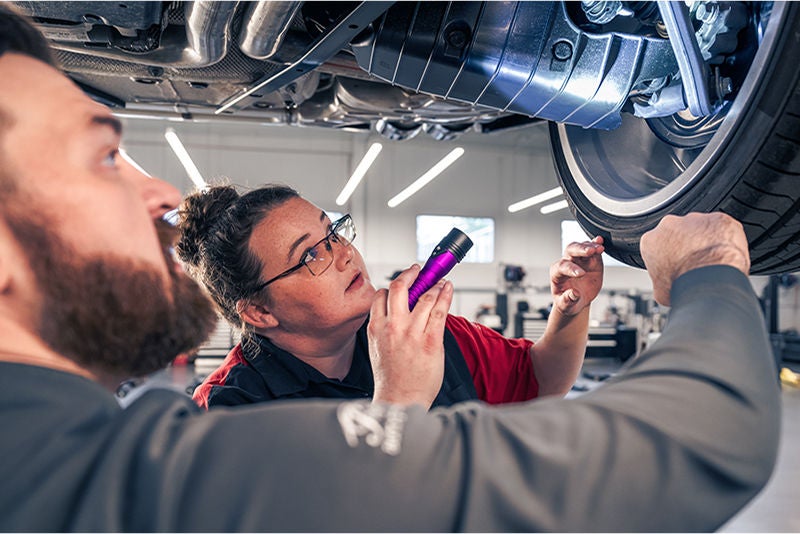 mechanic working on audi 