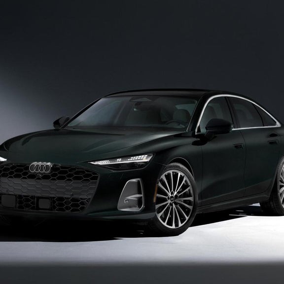 2026 Audi A6 Midnight Green Metallic studio front three quarter at Audi Sewickley near Pittsburgh PA