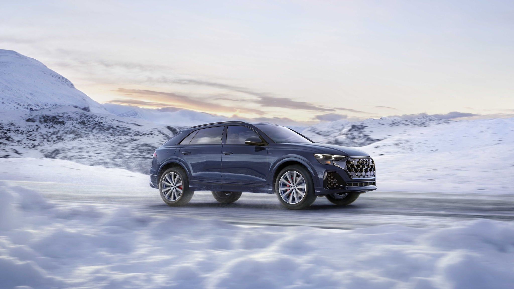 Three quarter view of an Audi A4 parked.