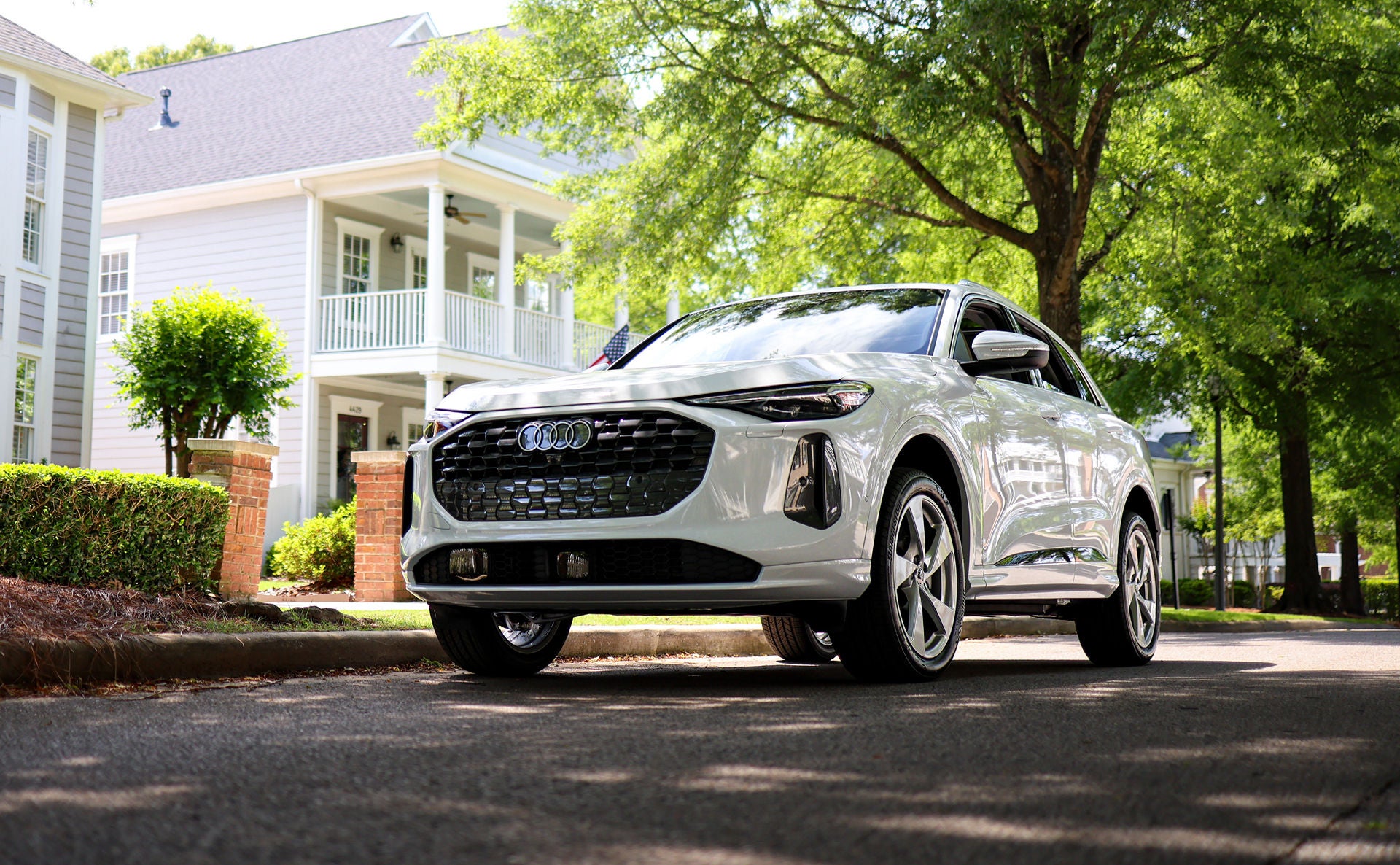 Three quarter view of an Audi q7 vehicle parked.