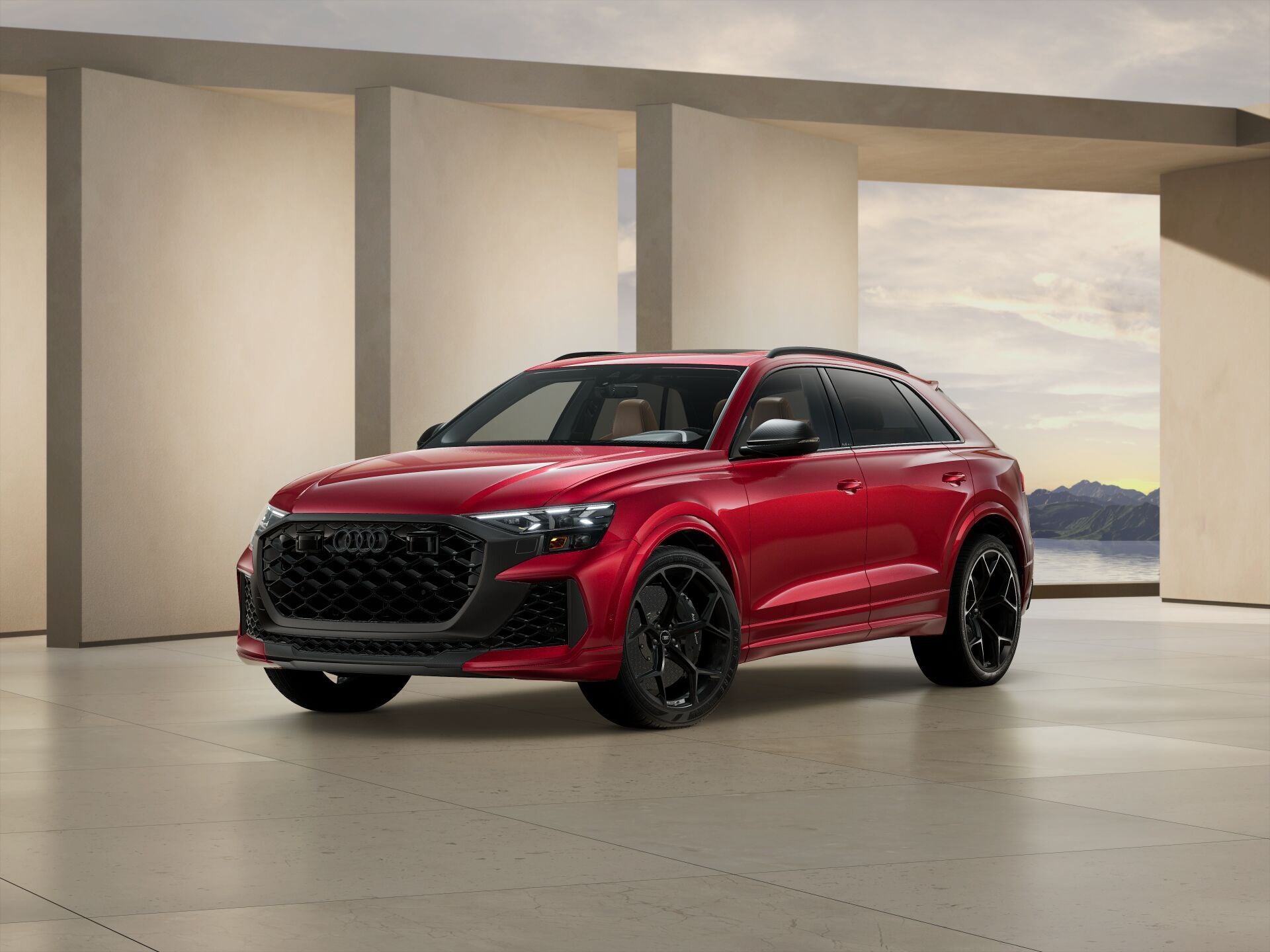 2026 Audi RS Q8 Performance trim level in red parked by modern structure