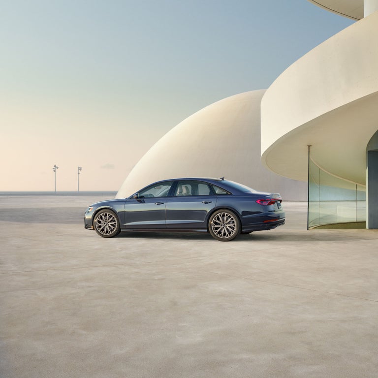 Side profile of the Audi A8 parked.