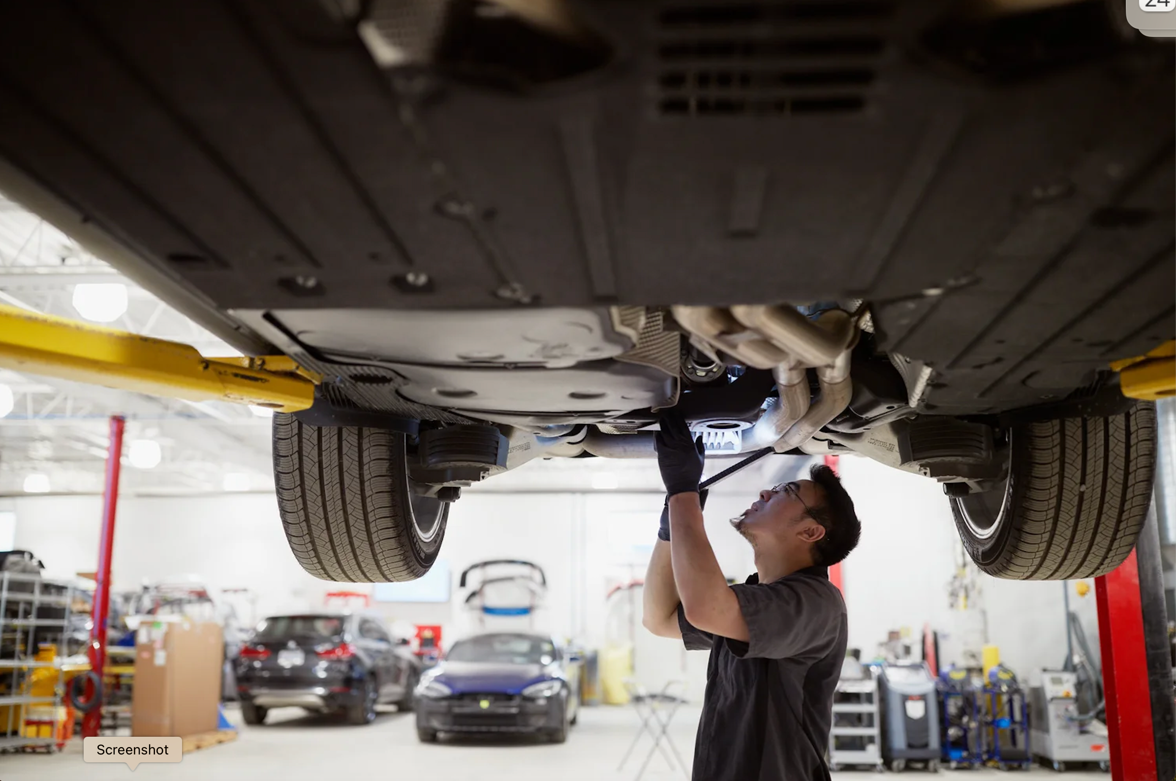 Audi collision tech inspecting an Audi SUV