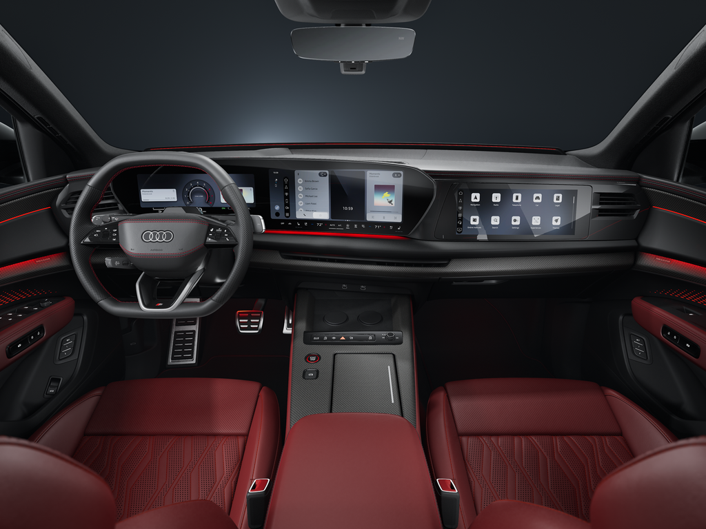 Frontal view from the rear of the cockpit, sports seats, and digital displays of the Audi SQ7 SUV.