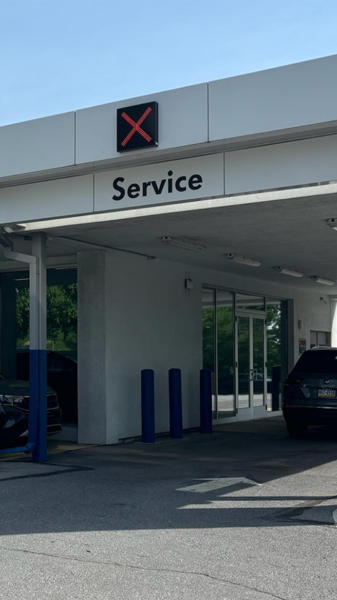 Side view of an Audi outside of the service department