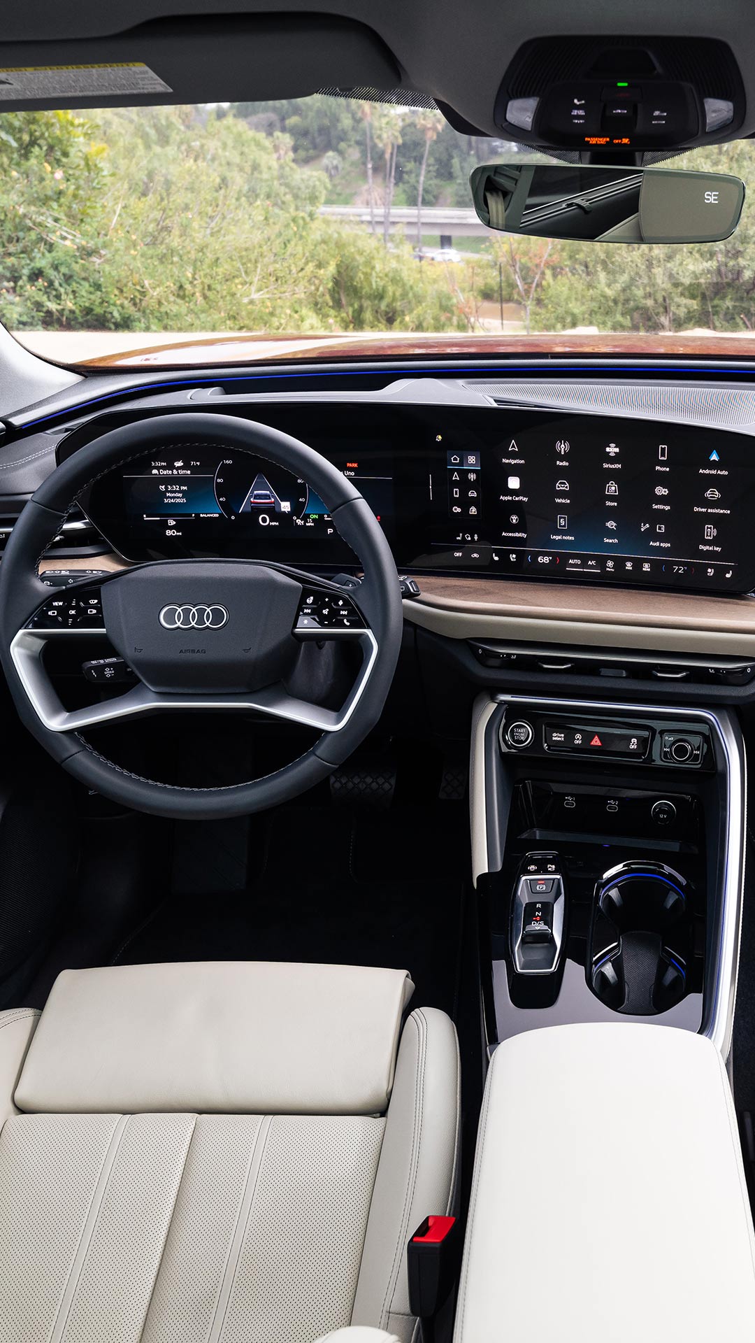 Close up on steering wheel and virtual cockpit in an Audi Vehicle.